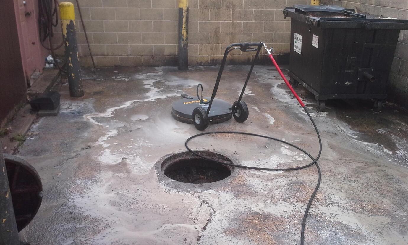 Heavy grease removal from concrete at a fast food restaurant Flat