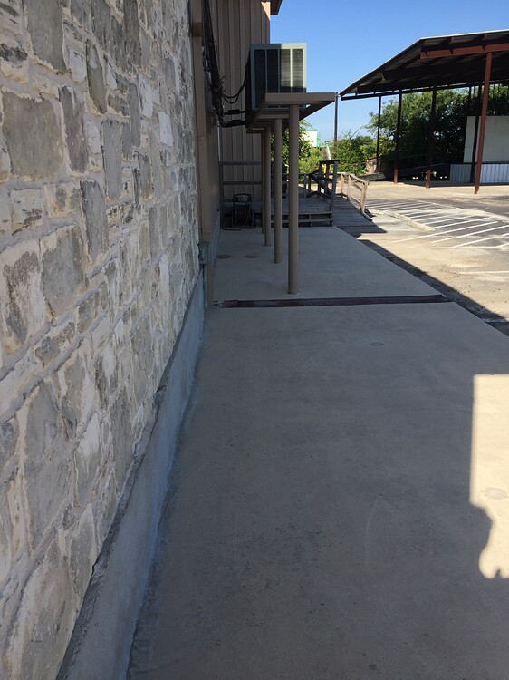 Black stains on limestone columns, pedestals how to clean? Stains