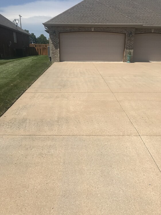 Discolored concrete or tinted sealer Stains/Surfaces Pressure
