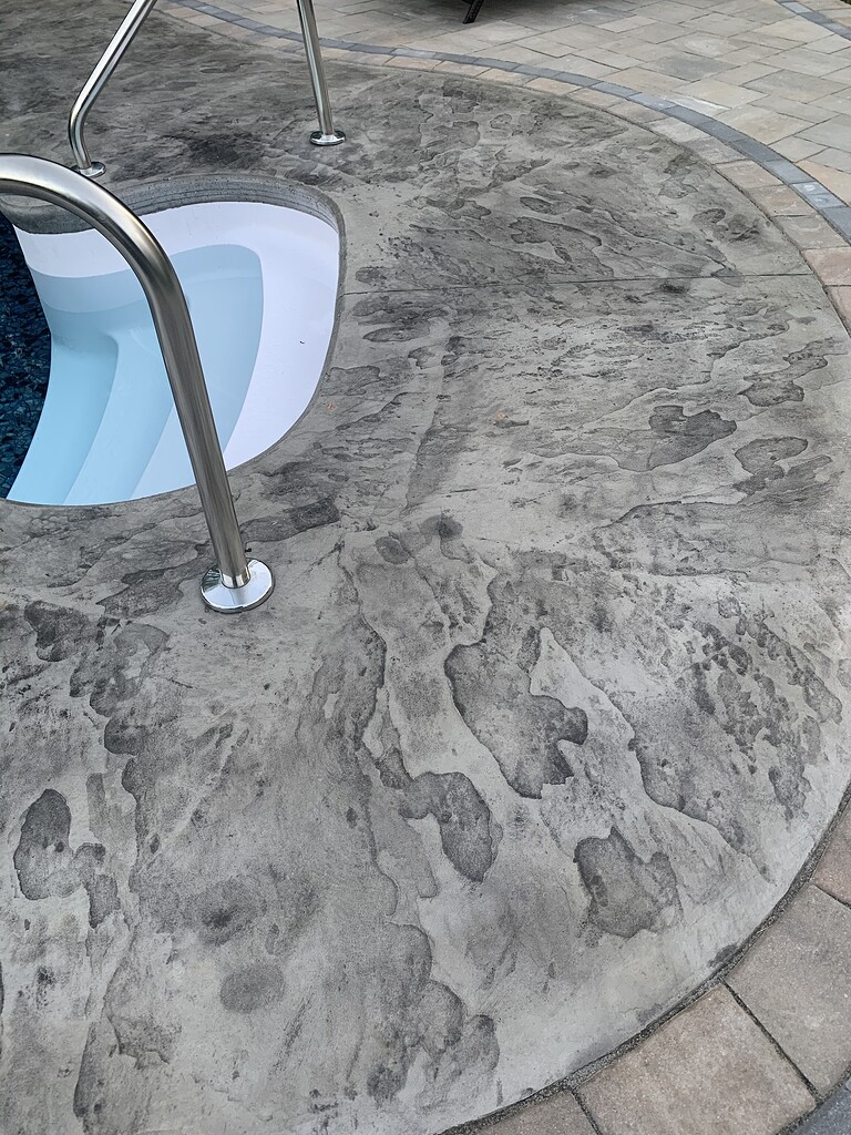 Slippery sealed concrete around pool Residential Pressure Washing