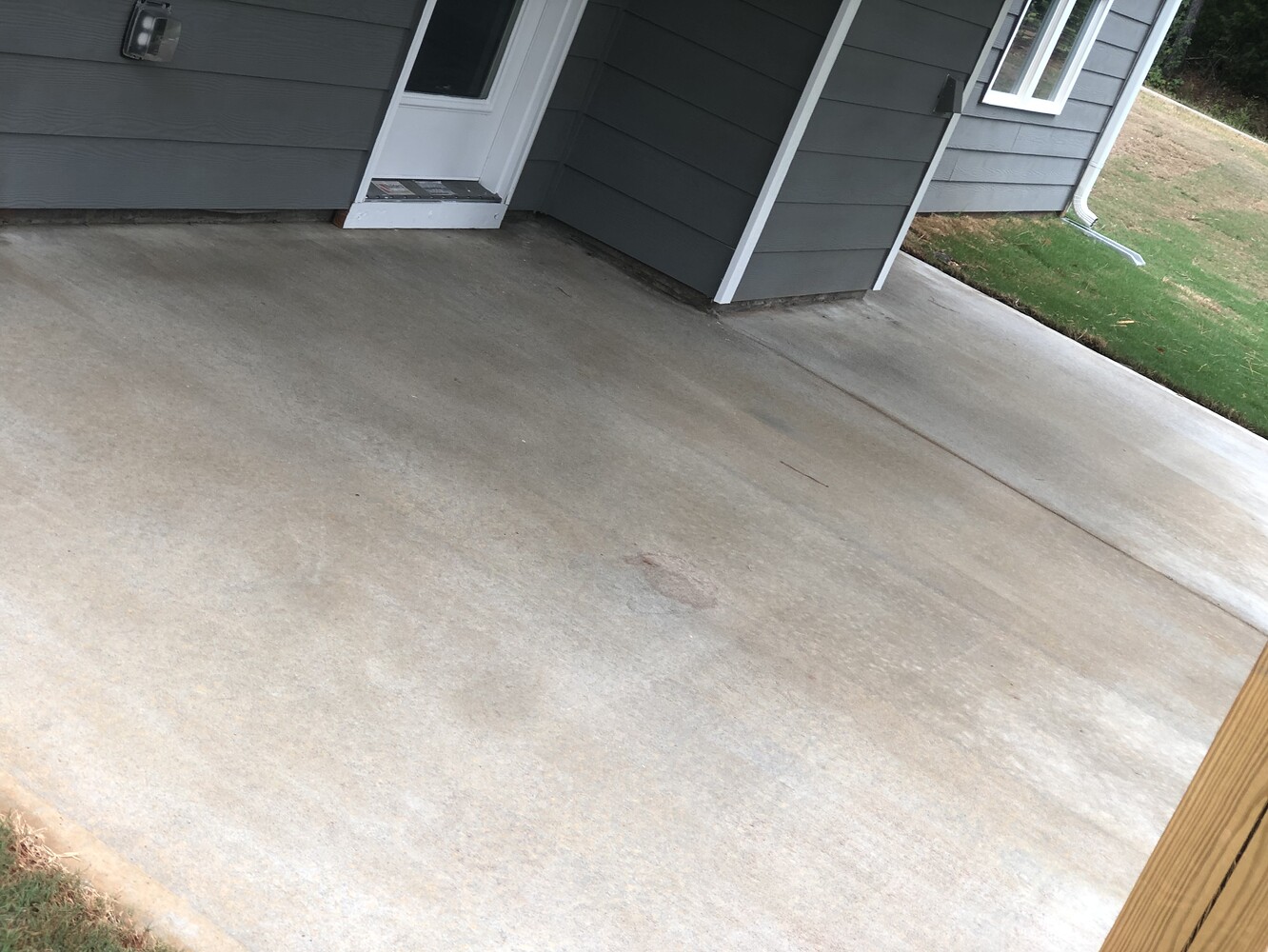 Yellow Residue on New (Not even a year old) Concrete Residential