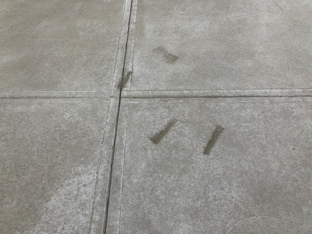 Acid wash stained a concrete driveway Stains/Surfaces Pressure