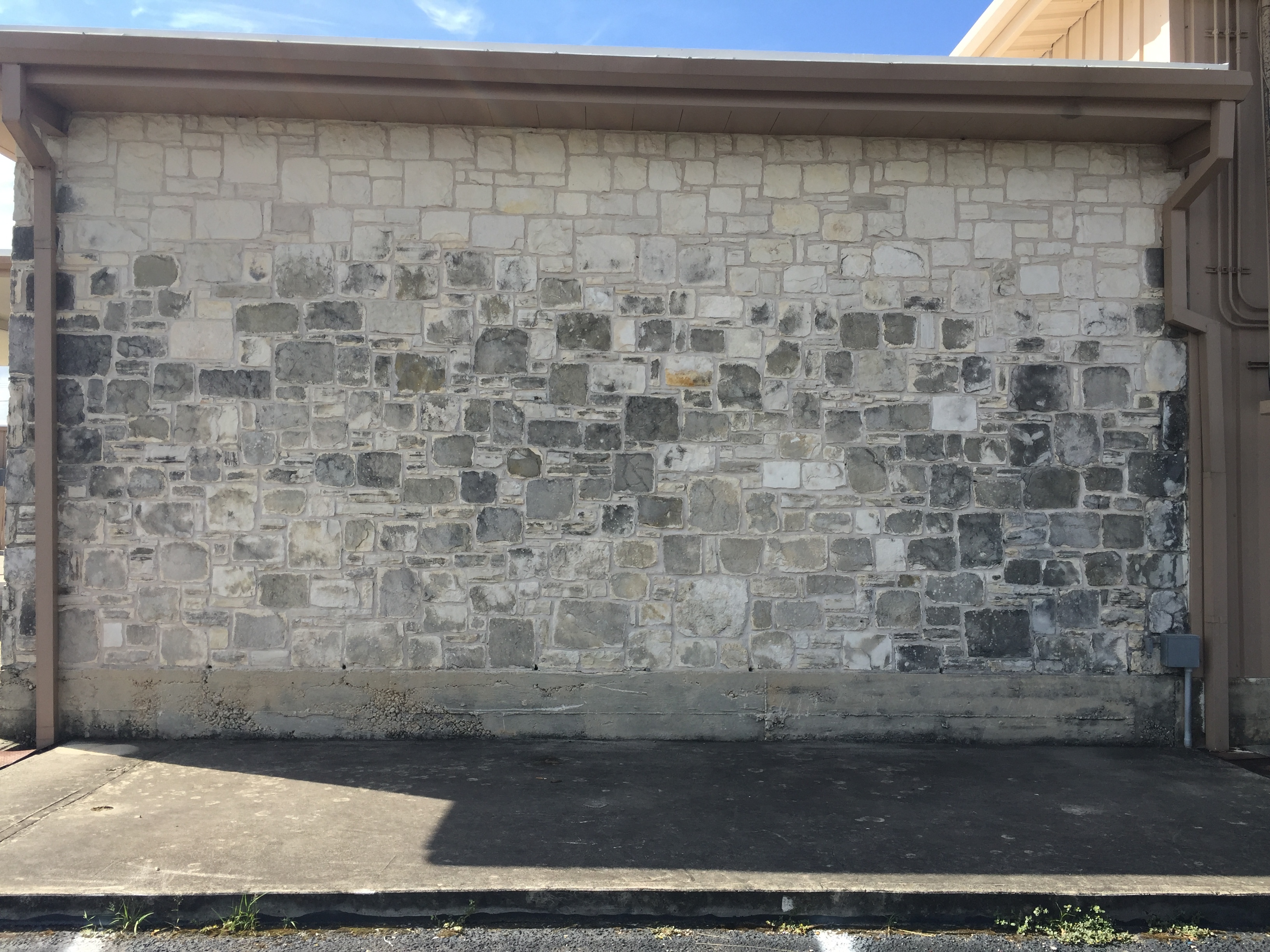 Black stains on limestone columns, pedestals- how to clean