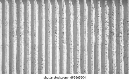 white-ribbed-concrete-wall-shadows-260nw-695865304