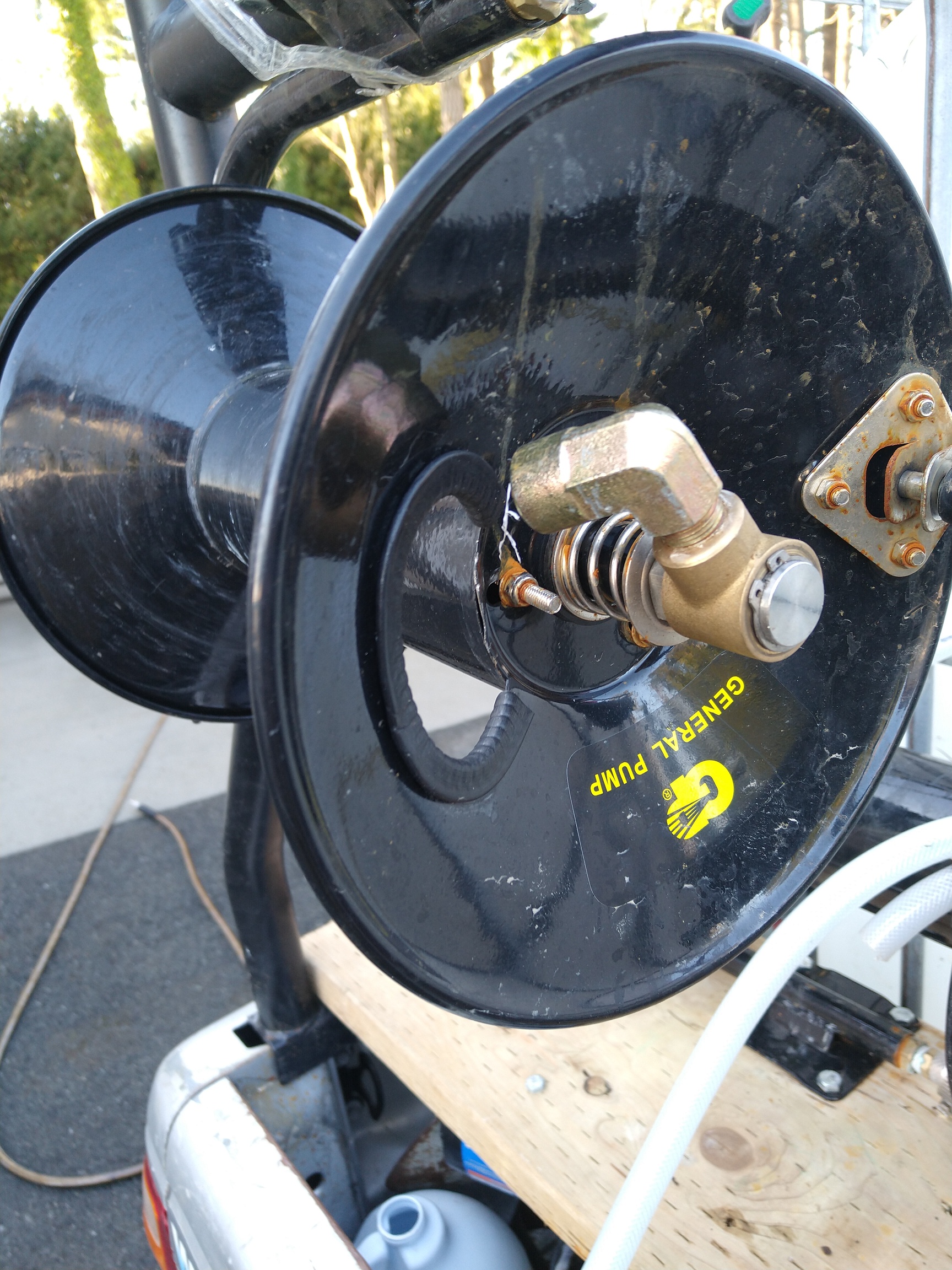 Should I be using a pressure washer hose reel for roof pump
